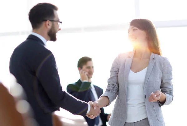 Handshake between colleagues in the workplace — Stock Photo, Image