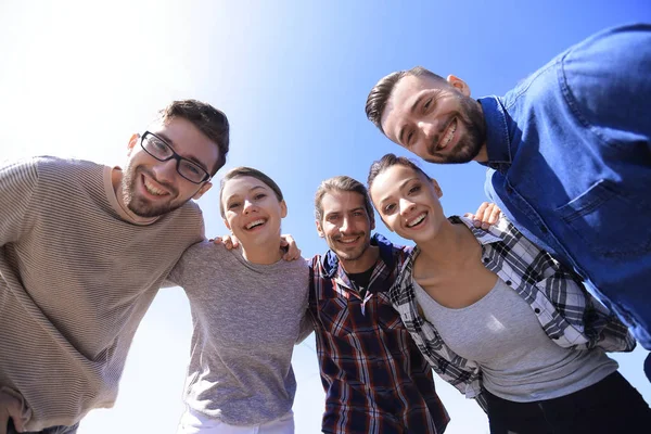 Bottom view.team of friends looking at the camera. — Stock Photo, Image