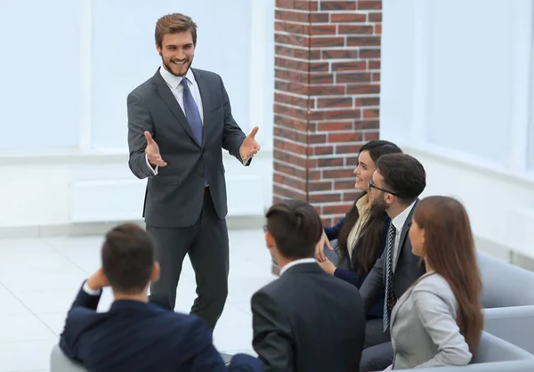 Business people group at meeting seminar presentation in bright — Stock Photo, Image