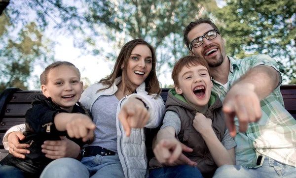 Close up.smiling family pointing at you — Stock Photo, Image