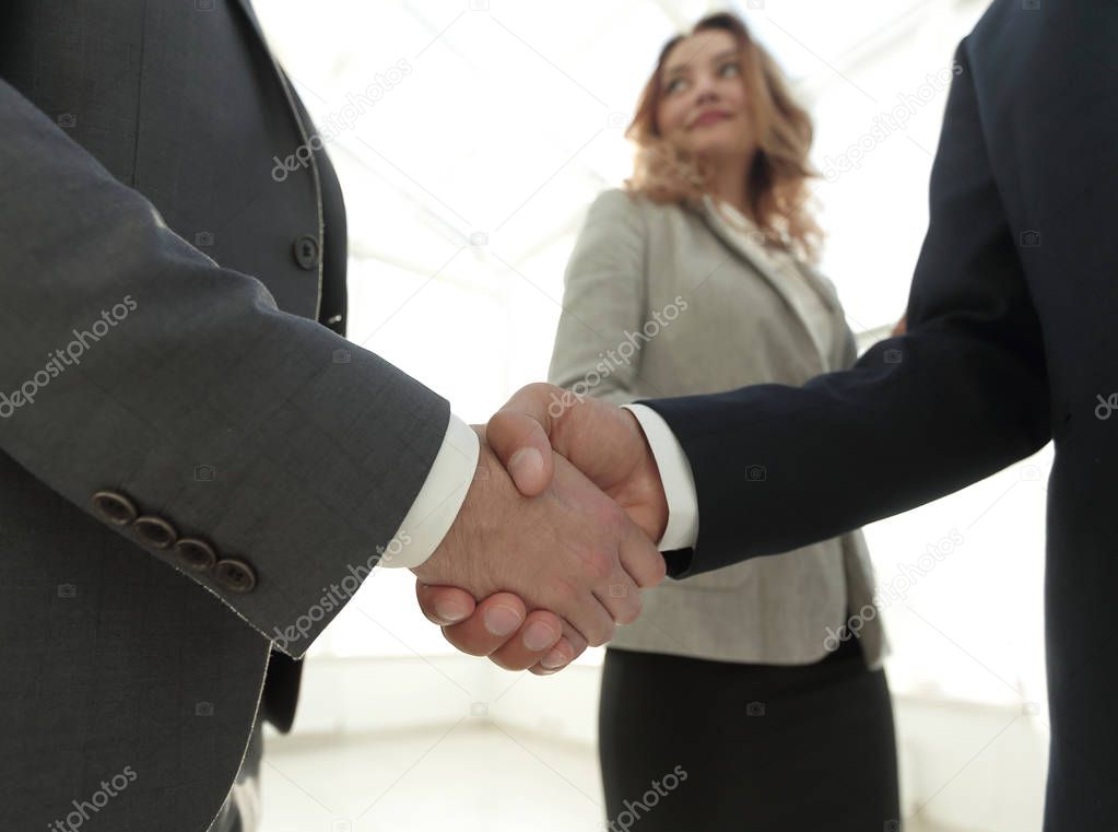Close up business man handshake together on meeting room