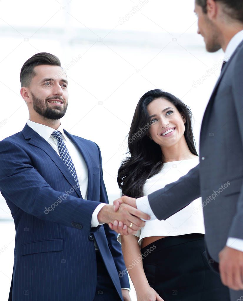 handshake business people at meeting