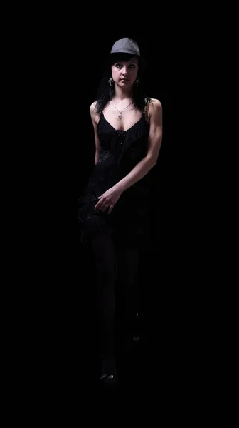 Жінка в танцювальній сукні ізольована на чорному тлі — стокове фото