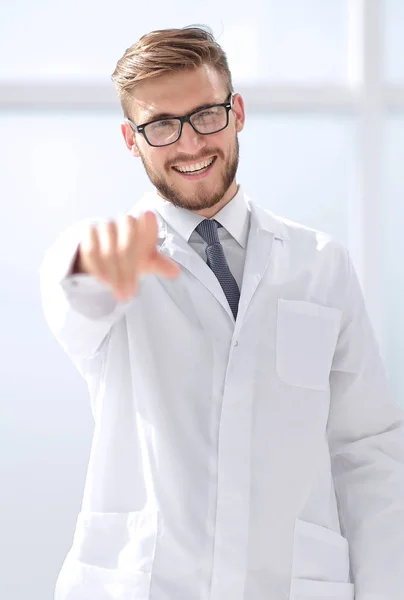 Portrait of a friendly therapist pointing at you — Stock Photo, Image