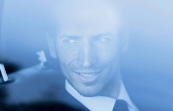 background image of the businessman in the car