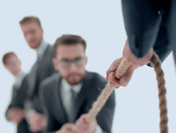 Image is blurred.the tug of war between business people. — Stock Photo, Image