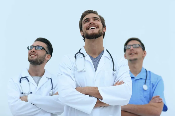 Gülümseyen tıbbi takım de kopya alanı arıyor — Stok fotoğraf