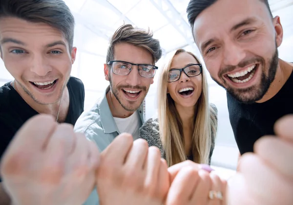 Friends celebrate the victory in the office — Stock Photo, Image