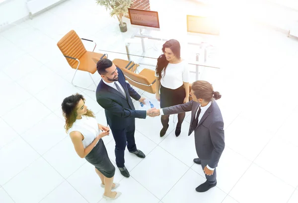 Vista do top.the handshake parceiros de negócios — Fotografia de Stock