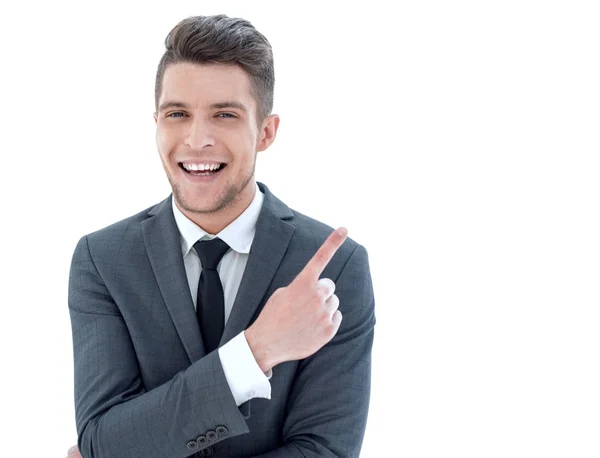 Ung snygg affärsman med strålande leende pekar med fing — Stockfoto