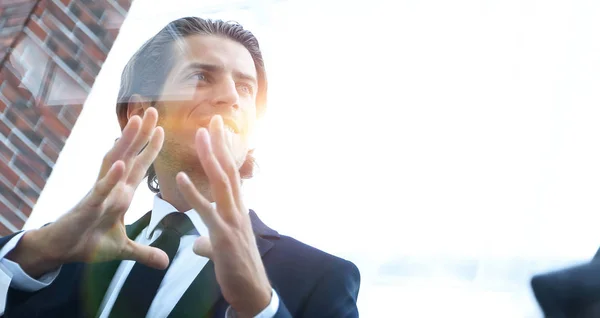 Geschäftspartner sitzen am Schreibtisch — Stockfoto