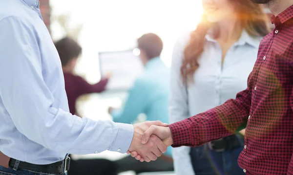 Business people handshake in modern office. — Stock Photo, Image