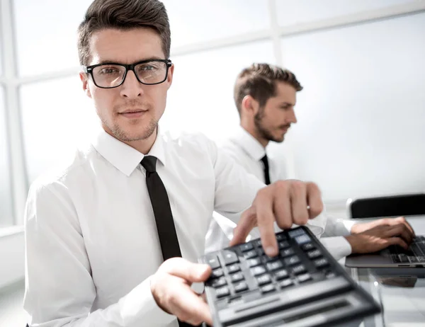 Smiling accountants discussing reports at the office — Stock Photo, Image