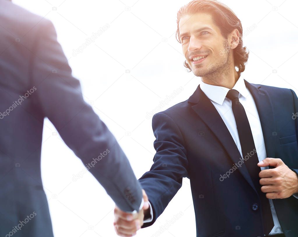 welcome and handshake of business partners