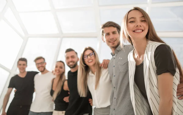 Successful group of business youth standing in a new office. — Stock Photo, Image