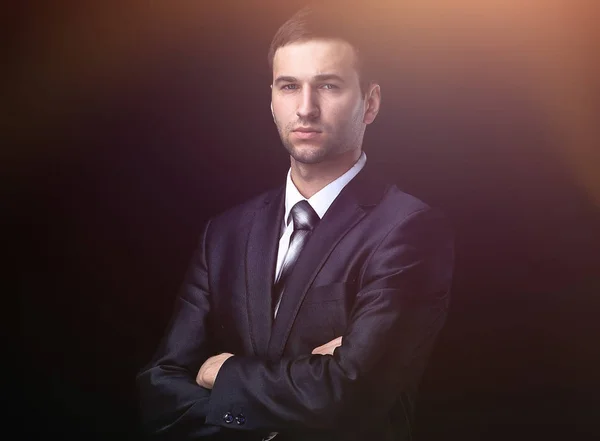 Portrait of confident businessman,isolated on a black — Stock Photo, Image