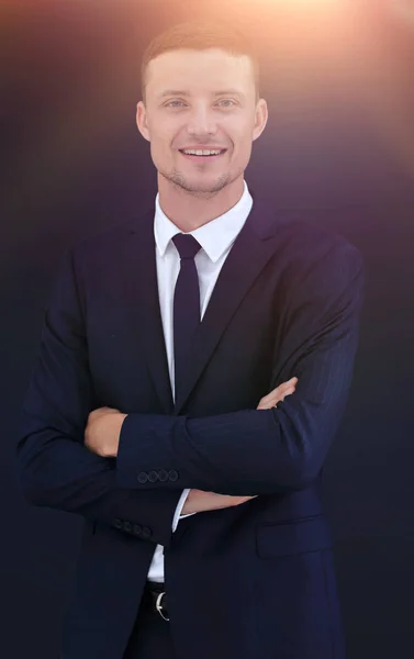 Retrato de empresario feliz aislado sobre un fondo oscuro —  Fotos de Stock