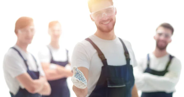 Foreman holding out his hand for a handshake — Stock Photo, Image