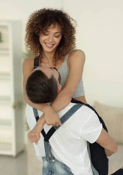 Happy family in a new apartment. — Stock Photo, Image