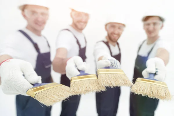 Grupo de trabalhadores da construção .isolated no branco — Fotografia de Stock