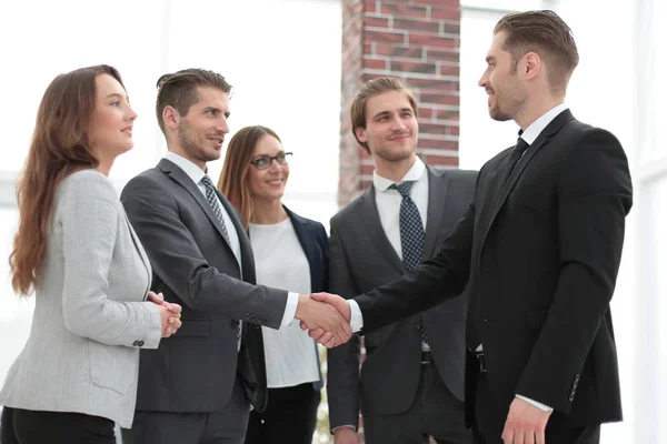 Business meeting of partners in the foyer — Stock Photo, Image