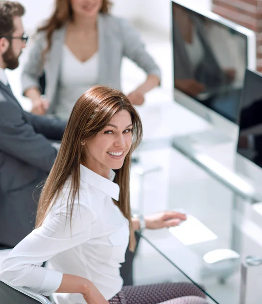 attractive business woman in the workplace in the office