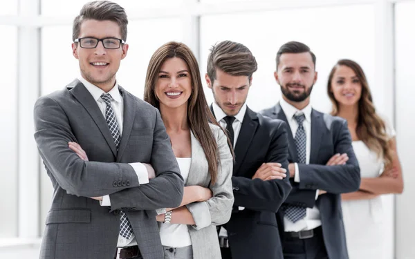 Professional business team standing next to the office window — Stock Photo, Image