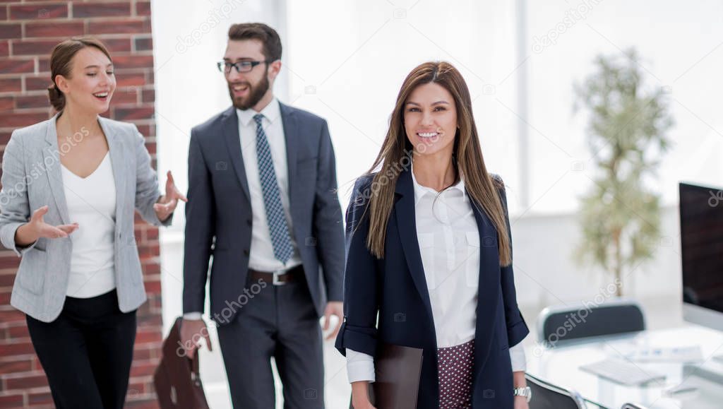 business woman and employees in the workplace.