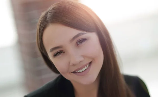 Close up portrait of young  business woman in modern office — Stock Photo, Image