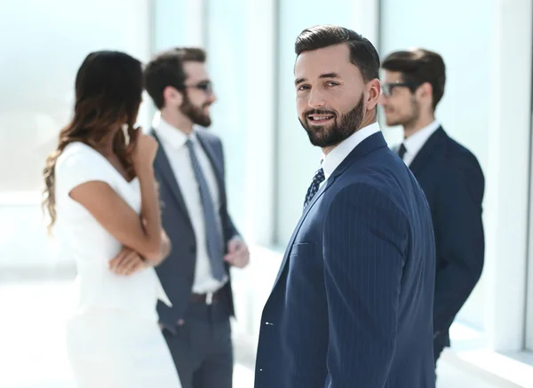 Employees standing in the lobby of the office — Stock Photo, Image