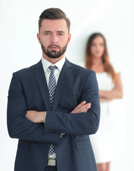 Portrait d'un homme d'affaires avec une femme en arrière-plan — Photo