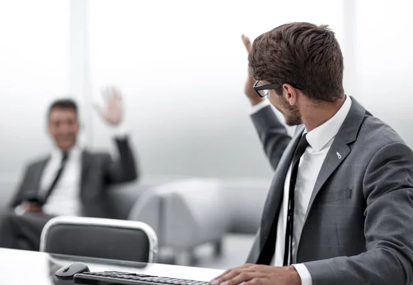 Successful adult man is looking at screen of modern gadget — Stock Photo, Image