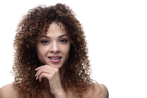 close-up portrait of a beautiful young woman with wavy hair.