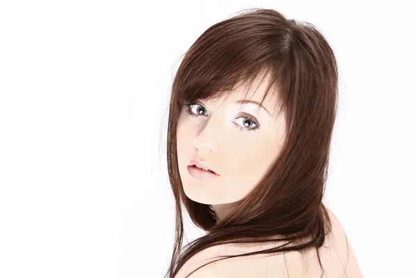 Closeup.face de jovem mulher no fundo branco . — Fotografia de Stock