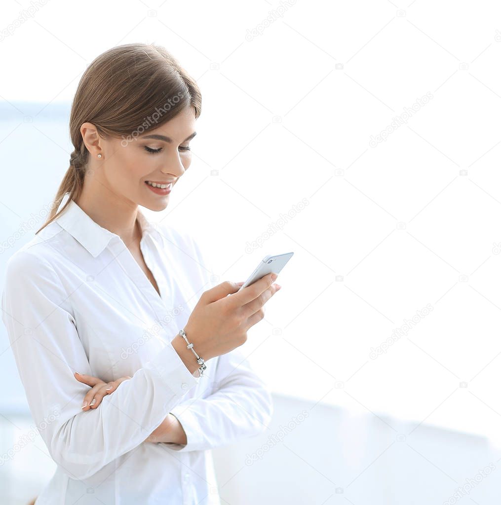 young professional reading SMS on smartphone,