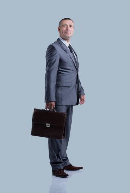 tam growth.rear görünümünde. boş ekrana bakarak işadamı