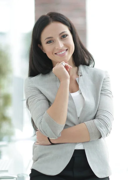 Modern business woman near the window in the office — Stock Photo, Image