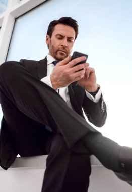 Onun Smartphone'da SMS tipik iş adamı