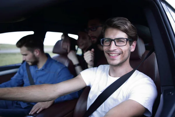 Close up side portrait of happy man driving car — Stock Photo, Image