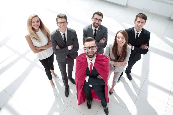 top view.businessman-Superman and his business team standing tog