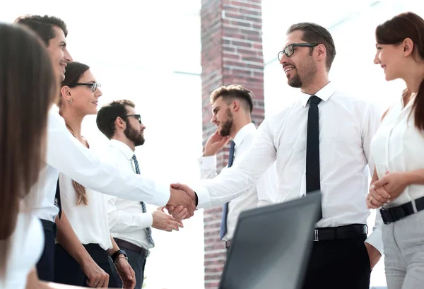 Handshake business people in a modern office — Stock Photo, Image