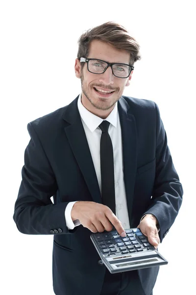 Homem aponta para a calculadora e olha para a câmera — Fotografia de Stock