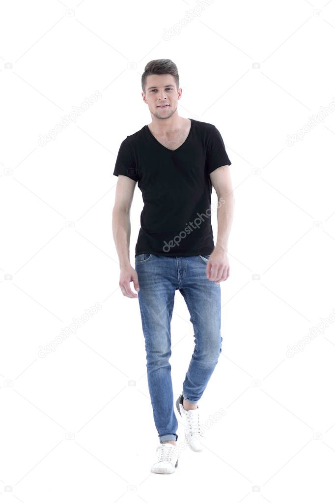 Happy smiling young man standing full length isolated on white b