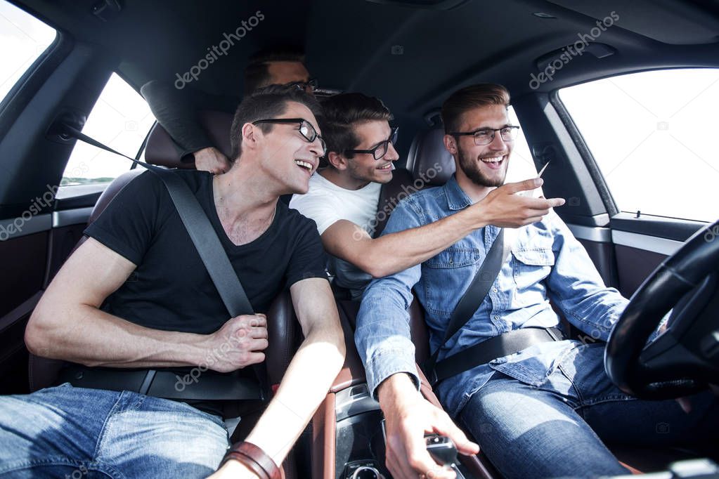 close up. friends talking in the car .