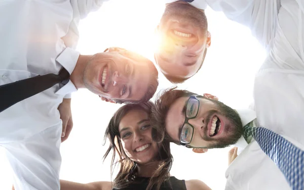 Successful business people with arms around each others shoulders. — Stock Photo, Image