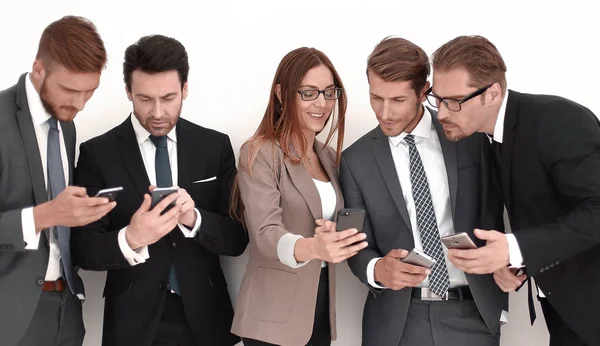 Group of business people reading SMS — Stock Photo, Image