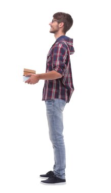 yan görünümü. Kitaplar ile gülümseyen erkek öğrenci.