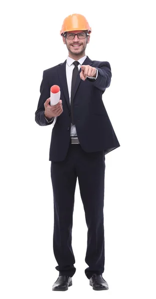 Smiling engineer in protective helmet pointing at you — Stock Photo, Image