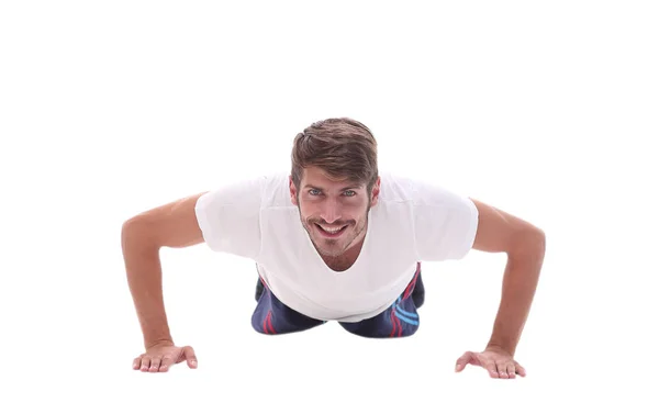 In volle groei. een man voert een push-up vanaf de vloer — Stockfoto