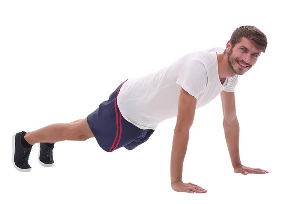 In volle groei. een man voert een push-up vanaf de vloer — Stockfoto